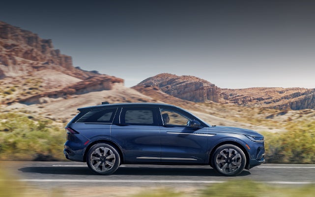 A 2024 Lincoln Nautilus® SUV is being driven in a desert setting. | Vision Lincoln in Wahpeton ND