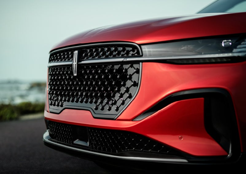 The sleek grille of a 2024 Lincoln Nautilus® SUV with the available Jet Appearance Package makes a bold statement. | Vision Lincoln in Wahpeton ND